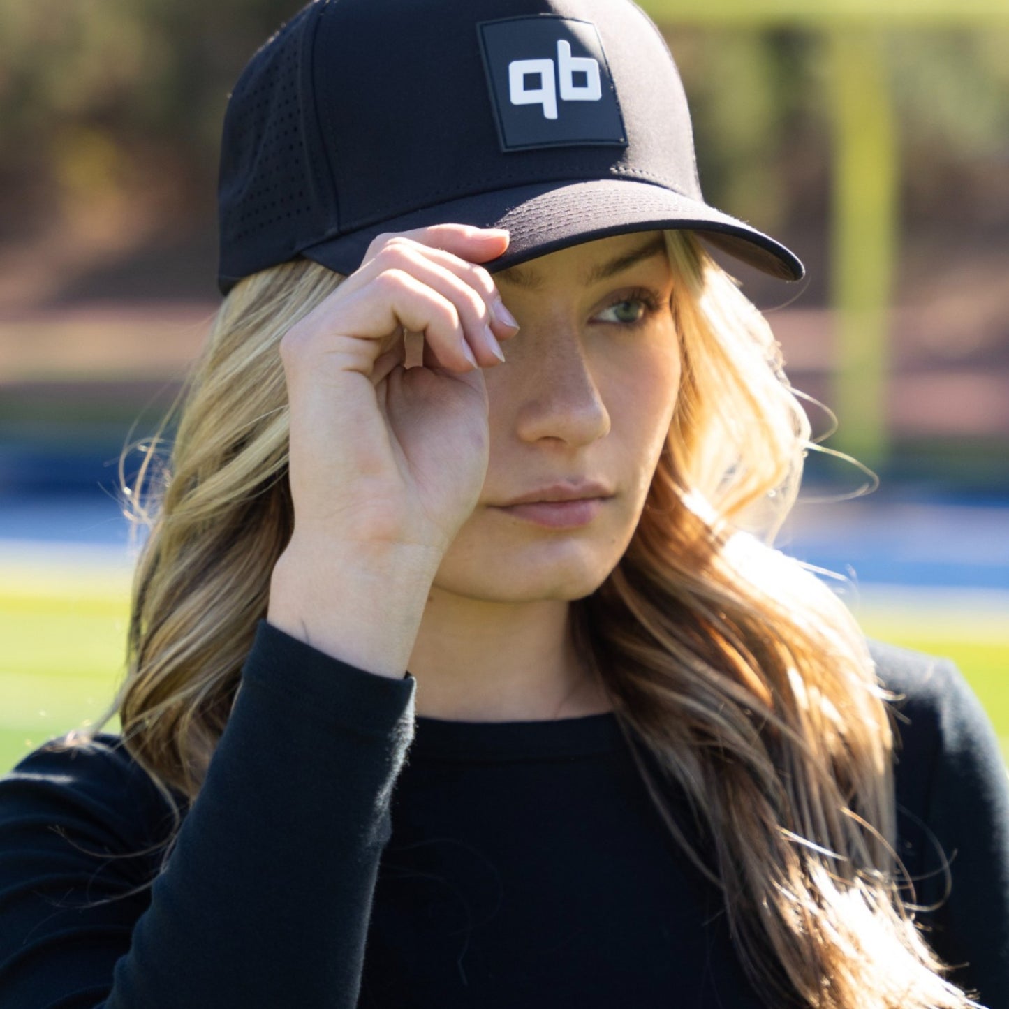 qb pocket passer black hat for quarterbacks and qbs close up women