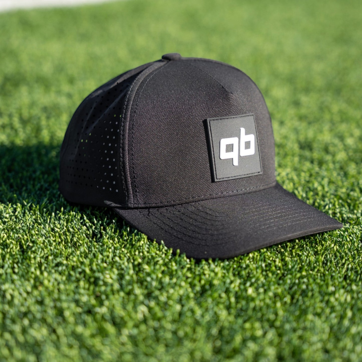 qb pocket passer black hat for quarterbacks and qbs close up