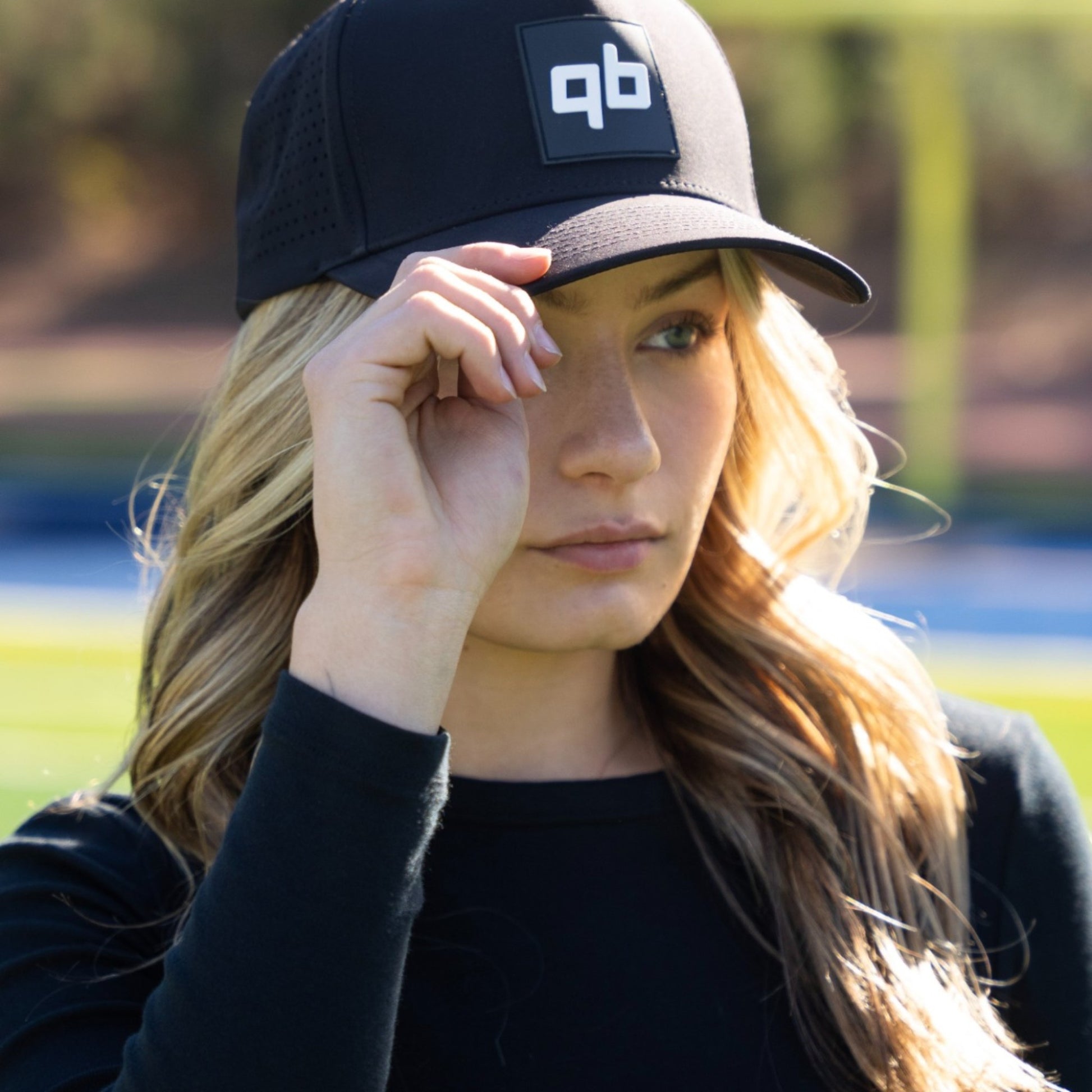 qb pocket passer black hat for quarterbacks and qbs close up women